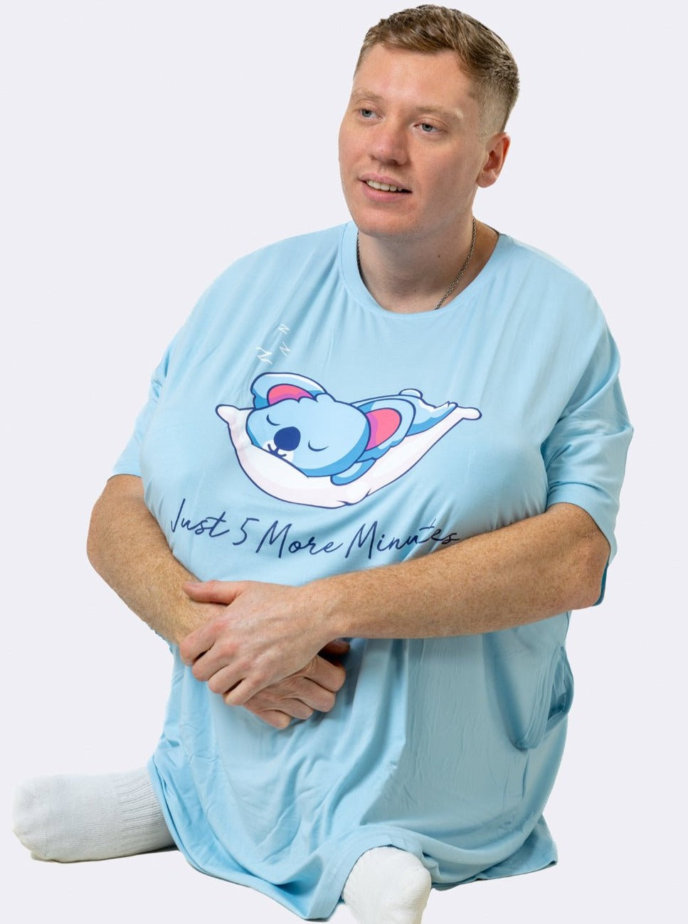 Koala Cuddleez Sleep Tee - Cuddleez blue oversized - male sat down in t-shirt close up